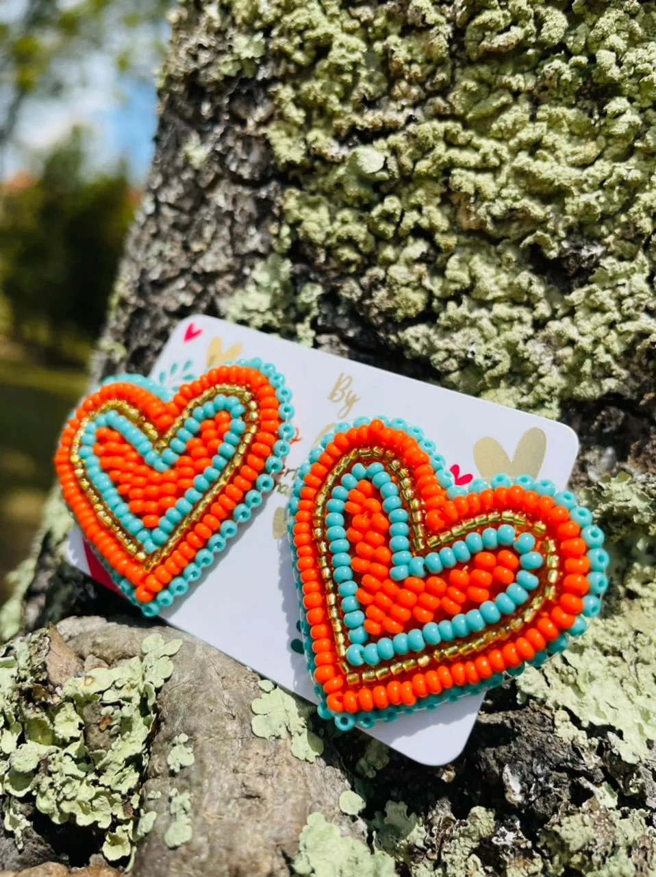  Topos de corazon naranja con turquesa