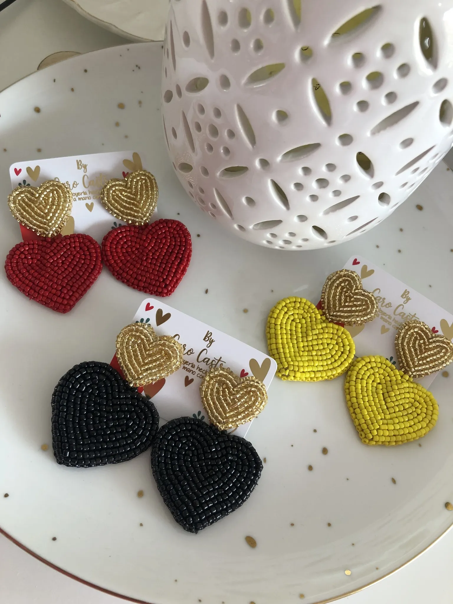 Aretes Doble Corazón con Topo Dorado 2